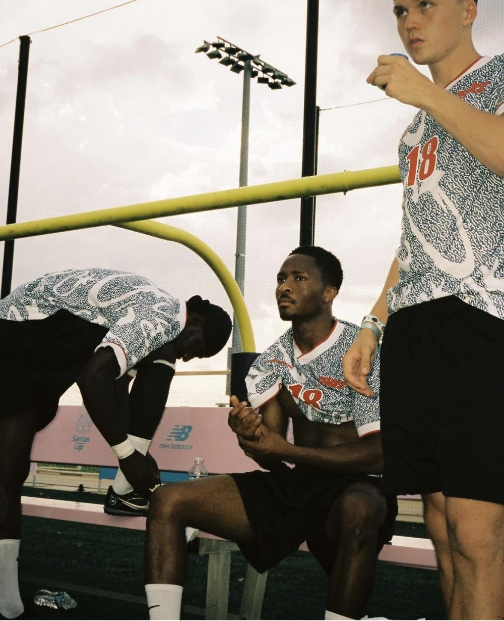 Blue and white all-over printed football uniform