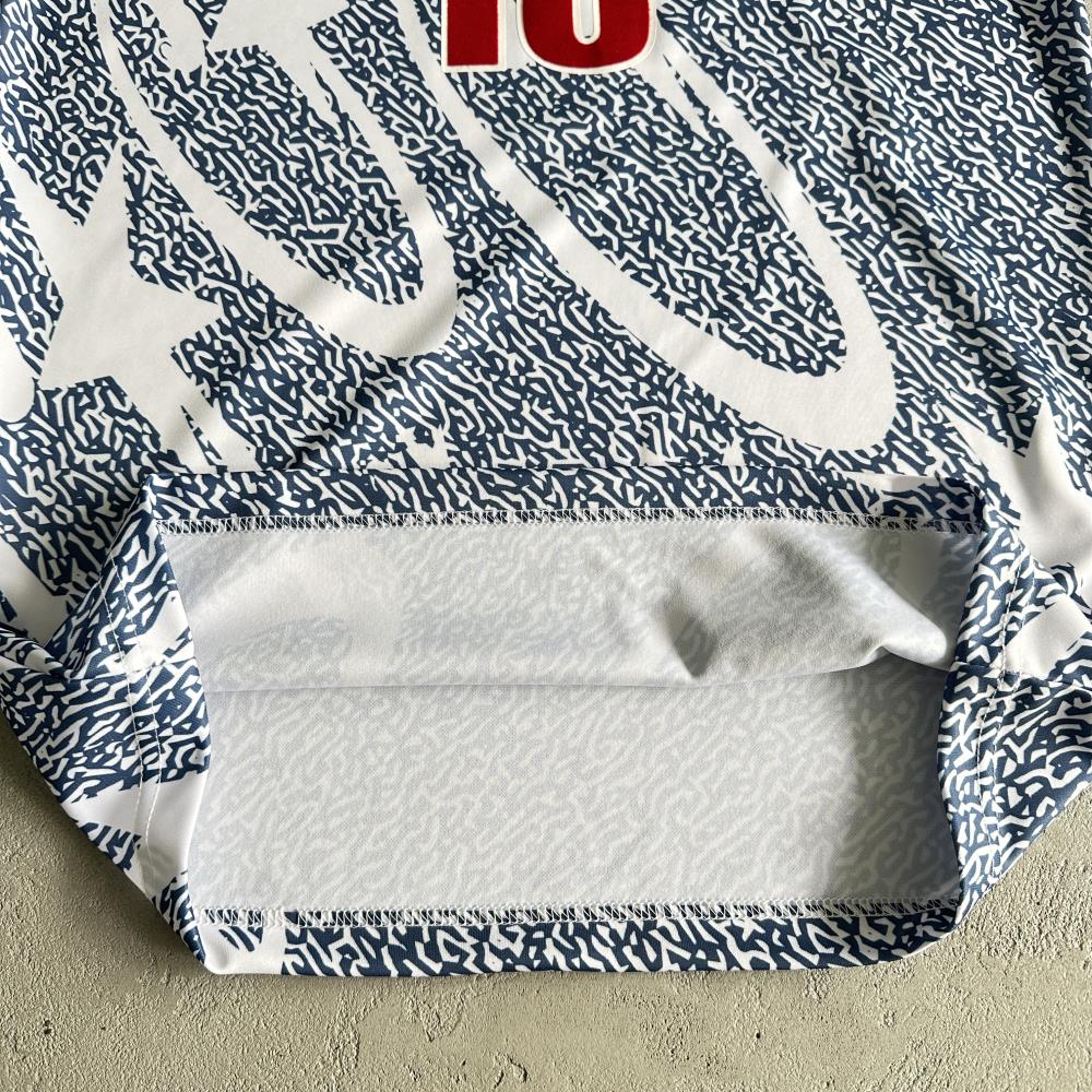 Blue and white all-over printed football uniform