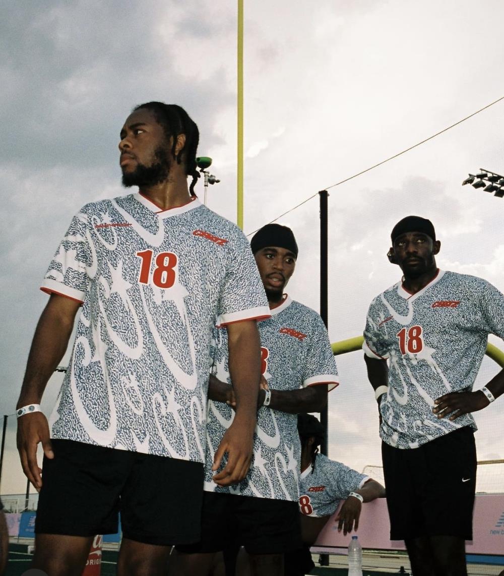 Blue and white all-over printed football uniform