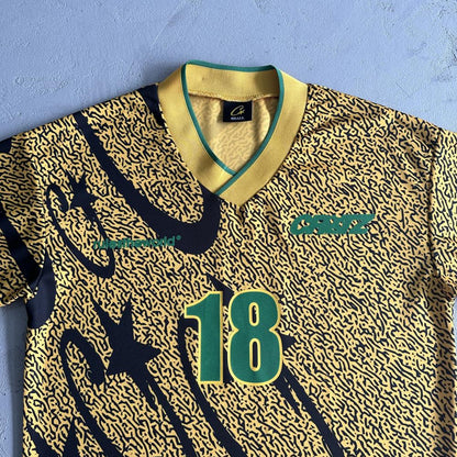yellow and black all-over printed football uniform